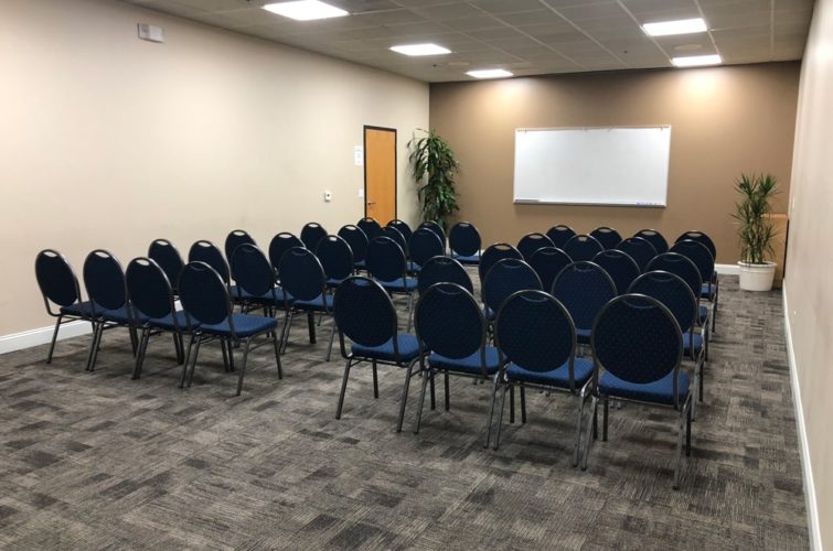 training room with whiteboard and chairs