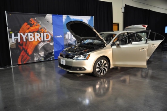 car with open door at Volkswagen 2013 Jetta Hybrid Release