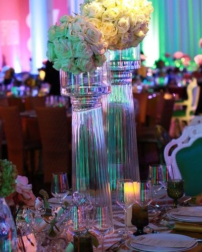 flowers and plates setting on the table at TSE Wedding Gala 2015