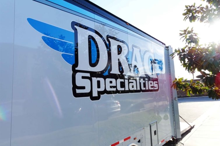 Bus with Drag Specialties logo at Super Show Expo
